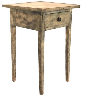 F50 LANCASTER COUNTY PENNSYLVANIA HEPPLEWHITE SIDE TABLE OYSTER WHITE PAINT WITH SMOKE DECORATION Pennsylvania paint-decorated one drawer stand of Lancaster County, Pennsylvania origin. Extensive smoke decoration on an oyster white background. One board tray top which is pegged on with applied raised molding. Dovetailed drawer with slightly rounded drawer front. Circa 1830-1840. Measurements: 18 1/4" wide x 19” deep x 28 1/4” tall