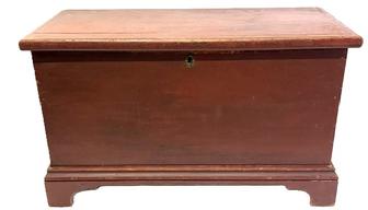 M301 Early 19th century original red painted Pennsylvania blanket chest with dovetailed case, applied bracket base and molded edge around lid. Clean, natural patina interior with lidded till inside. A large early circular picture of the legendary American Standardbred pacer horse named Dan Patch who set the world record for the fastest mile by a harness horse at 1:55 remains intact inside the lid. Square head nail construction. Circa 1830s. Measurements: 33 ¾ wide x 16 ¾ deep x 20 tall.