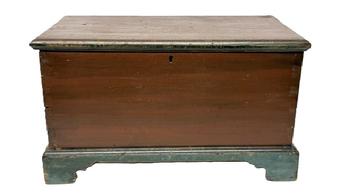 M1121 Early 19th century Pennsylvania original red and blue painted child's size blanket chest with dovetailed case and applied bracket base with cut out feet. The wood is poplar, six board dovetailed construction with applied molding surrounding the lid. The molding and bracket base are secured with wooden pegs. Clean, natural patina interior with small, lidded till. Circa 1800-1820s. Measurements: 20 ½ wide x 11 deep x 11 ¾ tall.