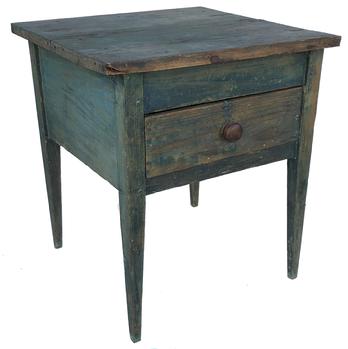 E498 Southern 19th Century North Carolina oversized country one drawer stand retaining a old blue painted surface, very unusual form with the large apron and smaller drawer.