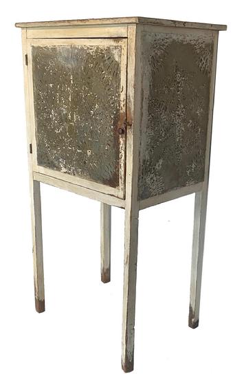 F169 A very rare Pennslyvania Painted pine Pie Safe,in old oyster white paint, 19th century, circa 1840 a single door which is ful mortised and pegged, with flower design in a circle hand punched large over size tins, the side tins are a star pattern, and the back tin is a straight sloted pattern, for veneration, resting on four tall legs, which is vey rare, ll original 64 1/2" high x 33 3/4" wid e24 1/4" deep
