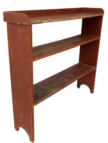 F201 Mid 19th century Exquisite Tall Bucket Bench from Shenandoah Valley Virginia Bucket Bench in the original bittersweet red paint, the shelves are double mortised through the ends, with a applied shaped gallery at the top, yellow pine and poplar squared head nail one board construction, with high cut out ends Measurements are 57 1/2" wide x 53 1/2' tall x 13" deep