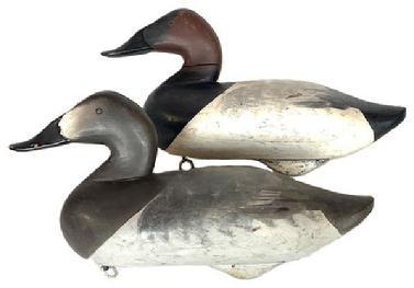 H390 Pair of 1950's Canvasback Decoys carved by Charlie Joiner, Chestertown Maryland - 1950 - both are branded (F.B.W) in the original paint.  