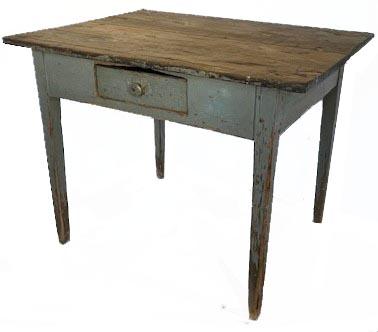 L86 19th century Maryland original gray painted one drawer worktable resting on tapered legs. Dovetailed drawer. The apron is mortised into the legs. Circa 1850s. The wood is pine. Measurements: 37 ½ wide x 28 deep x 28 ½ tall. Apron to floor measures 22.    