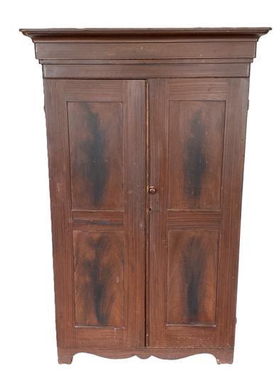 **SOLD** K1530 19th century Pennsylvania two door wardrobe with original paint decorated surface boasting paneled doors and ends, resting on a decorative cut out base. Molding and beaded edging surrounds the doors. Corners are rounded and top molding is removeable. Interior shelving is also removeable. Measurements: Top is 46 &frac14;� wide x 18 &frac34;� deep. Case is 40� wide x 15 &frac34;� deep. Overall height is 72� (6�) tall. 