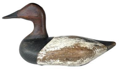 K124 High head Canvasback Drake decoy carved by Robert "Bob" McGaw (1879-1958) of Havre de Grace, Maryland boasting the worn, original painted surface. Original staple, ring, and weight intact on bottom.