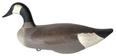 J340 Canadian Goose decoy carved by Madison Mitchell, Havre de Grace, MD (1901-1993) retaining its original painted surface. This is a weighted, full body sized goose decoy measuring approximately 24" long x 11 tall x 10 wide.