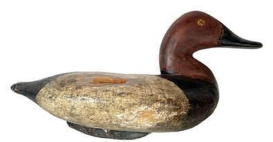 **SOLD** K48 Canvasback Drake Decoy carved by Capt. Ben Dye (1827-1896) of Perryville, MD bearing second coat of working paint. Original iron keel weight intact on bottom. Wear indicative of use. Approximate measurements: 14 ½ long x 6 wide x 7 ½ tall