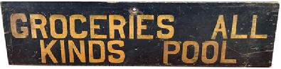 J235 Wooden trade sign advertising “GROCERIES ALL KINDS POOL”. This single-sided sign was found in Pennsylvania and bears hand painted lettering in mustard paint on a black painted background on a single piece of early pine wood. Two small battens on back – which appear to be original – have kept the sign from twisting / warping. Measurements: 34” wide x 8 3/8” tall x 7/8” thick
