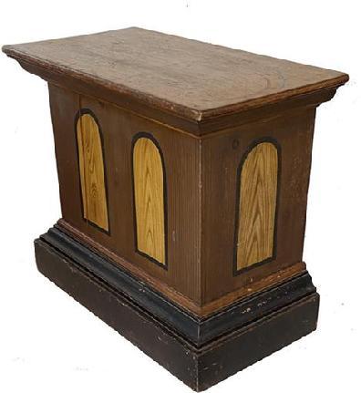 G83 19th century Pennsylvania small Country Store Counter, in decorated paint, with two mustard painted panel in the front, and one on each end, one board top. The back is open with a single drawer