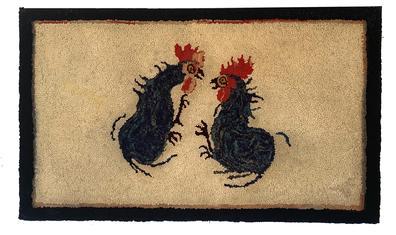 G297 Hand hooked rug depicting two fighting Roosters. Maker created dominant eyes, detailed combs, a few standing/loose feathers and pointed feet on each bird.