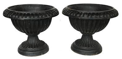 **SOLD** K10 19th century matching pair of small, solid cast iron garden Urns bearing old black painted surface. Each Urn measures 10 ¾” tall x 12 ½” diameter (at widest points) x 7 ¾” diameter (bottoms)