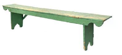 L281 19th century Pennsylvania Wash Bench with its original dry green painted surface. This bench boasts decorative cut out feet and splayed legs affixed to the top by way of a double mortise. The drop apron along the front is attached with cut nails and features shaped ends. The original mortised cross braces on back help make this bench sturdy and tight. Circa 1850. Measurements 72 (6) long x 11" deep x 17" tall.