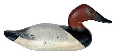 L10 Upper Bay Canvasback Drake Duck Decoy carved by Madison Mitchell of Havre de Grace, MD (1901-1993). Branded ��GWK� on the bottom.  Original painted surface with glass eyes that were added later.  