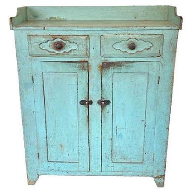 **SOLD** K136 Mid-19th century Pennsylvania original robin egg blue painted Jelly Cupboard featuring an applied dovetailed gallery, two dovetailed drawers over two fully mortised and pegged doors, nice high cut out foot, and half-moon cut out ends. Circa 1850s. The natural patina interior boasts sturdy shelves for storage. Measurements: 43� wide x 17� deep x 51 &frac34;� tall (back) x 47 5/8� tall (front)   