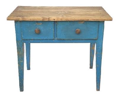 K1732 / TB3 Nice 19th century two-drawer sideboard table / server with original blue painted surface and two-board, scrubbed top resting on splayed Hepplewhite legs. Wooden pegged and wire nail construction. The drawer stretchers are mortised. The wood is pine. Found in Pennsylvania. Circa 1860-1880s. Measurements: 34 ¼ wide x 21 deep x 28 ¼ tall. (19 ¼ apron to floor).