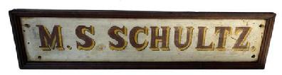F287 19th century Pennslyvania Painted pine trade sign, , M. S. Schultz, very colorful with white back ground with red letteres and yellow high lites, with nice walnut applied molding Image Properties