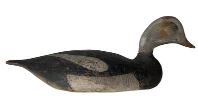 Even as an adult, with a formal art education, at Toronto Art School, and other tools at his disposal, Tyler continued using simple, traditional tools to produce aesthetically pleasing, functional decoys, to fulfill a great demand by local hunters, gunning clubs and tourists. this is a great example of Llyod's style of carving in original paint. From the collection (rig) of J.B.(Joe) French, from New England. He never painted the bottoms of the decoys, as he said that was a waste of paint. He retired from carving in 1953.