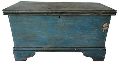 E478 Mid 19th Century Eastern Shore, MD blanket chest. All square nail construction with a really nice applied bracket base and molded lid in early blue paint. The primary wood is poplar. Circa 1850’s. Measurements: 28 3/4” wide x 13 1/4” deep x 16 1/2” tall