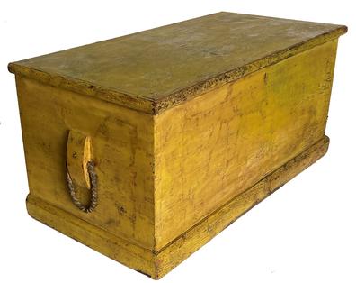 RM1094 19th Century Maryland Nautical Sea Chest in old yellow over blue paint, with original rope and leather Becketts (handles). Dovetailed case with applied base. Circa 1830. Measurements: 41” wide x 20 1/4” deep x 19” tall