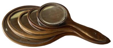 F180 Antique Shaker or Shaker Style Carved F180 Wooden Hand Mirrors a collection of five wooden hand held mirrors with hold for hanging beveled mirror 16" long x 8" wide largest mirror the smallest is 9" long x 5" wide
