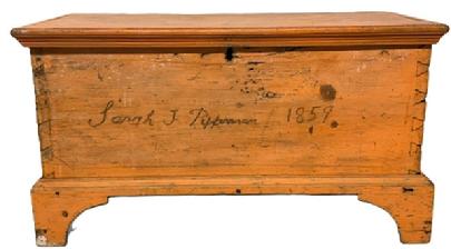 M260 19th century Lancaster County, Pennsylvania diminutive blanket chest in original dry pumpkin paint - identified and dated on front - "Sarah J. Pefferman 1859". Six board dovetailed construction with applied dovetailed bracket base featuring nice cut outs, applied molding around three sides of the lid secured by small square head nails and small lidded glove till mortised inside. Measurements: 25 wide x 13 deep x 15 3/4 tall.