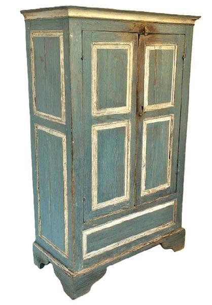 GM1 Exceptional 18th century Eastern Shore, Virginia original blue and white painted raised panel Clothes / Linen Press adorned with two raised panel doors, each with two panels, over one long panel below the doors. Each end is adorned with two large, raised panels. Cupboard rests on an applied bracket base with nice cut out feet. Top is surrounded by crown molding. All of the rails and tenons are mortised and secured with wooden pegs.  The doors are attached with their original snipe hinges. A wooden turn knob at the top secures the doors closed. The extensive wear around this knob is evidence of many years of use. The wood is yellow pine. Rosehead nail and wooden pegged construction. Circa 1740s-1760s. Measurements: 39 &frac12;� wide x 20 &frac34;� deep x 65� tall. (Reference Book: Eastern Shore, Virginia Raised-Panel Furniture 1730-1830 by The Chrysler Museum Norfolk, Virginia � pages 32-39.)  