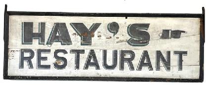 J446 Fantastic double sided wooden trade sign advertising Hays Restaurant with a painted hand pointing the direction. The lettering and directional on each side is hand painted in original black paint with green highlighting / shadowing on a white background