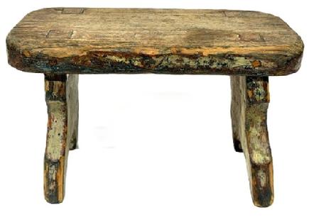 M257  19th century original blue painted Stool featuring a nice cut out design on each leg/end of the stool. The legs are double mortised through the top. Very sturdy. Circa 1840. The wood is white pine. Measurements: 12" long x 7" deep x 7 1/2" tall