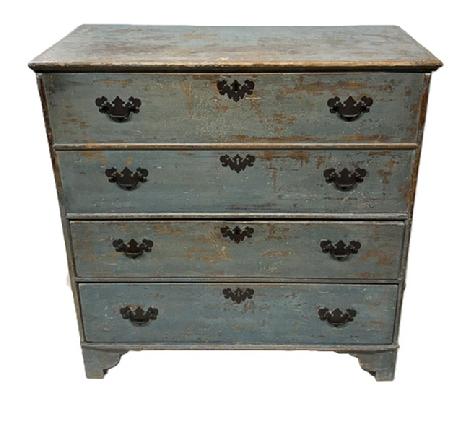 M255 18th century William and Mary Chest over drawers with snipe hinged lid in original dry blue paint. American, Circa 1720 chest with two false drawers over two dovetailed drawers with mortised stretchers. One board construction. Applied molding to the lid with till inside. Two board back secured with rose head nails. The wood is white pine. Measurements: 37 ¼ wide x 18 ¼ deep x 38 tall.