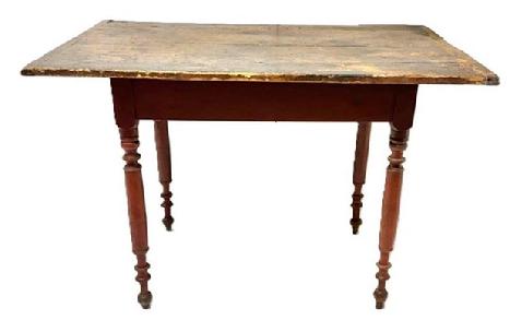 M206 Late 18th century Pennsylvania Sheraton red painted two board top pine Worktable resting on nicely turned legs. Rosehead nails. The apron is fully mortised and pegged into the legs. Measurements: 42 ¾ wide x 29 deep x 29 tall. Overhang on the ends is 6 ¾ and 6 7/8, whereas the overhang on the sides is 4 on each side. Apron to floor measures 23.