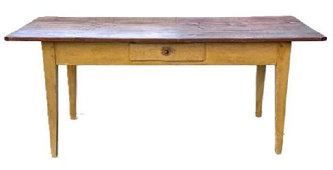**SOLD** Q191 Mid-19th century Massachusetts farm table with one drawer on side, retaining its original mustard base with red-washed top. This great table features a three-board top resting on nicely tapered Hepplewhite legs. The apron is fully mortised and pegged into the legs. Square head nail construction. The woods are pine and ash which is a typical New England wood. Circa 1850s. Measurements: 73 ¾ long x 34 ¼ wide x 30 ¾ tall. (Apron to floor is 23 ¾.)