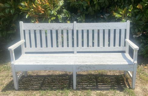 M210 Early 20th century Garden Bench - well constructed, very sturdy, in the old white paint, with a slat back and seat. This Bench was made to be used outdoors, could be used indoors. Overall Measurements: 72 ¼ wide x 23 deep x 37 ½ tall in the center of the back. The seat is 19 deep x 17 tall.