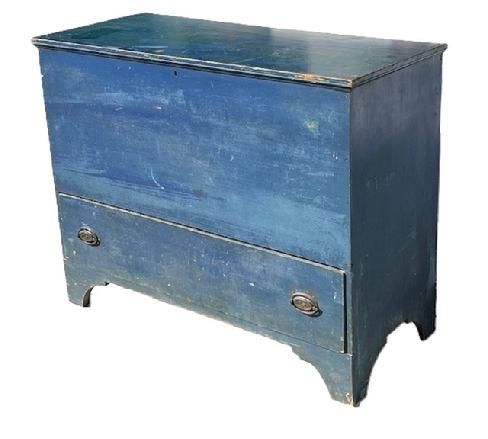 L100 Early 19th century New England chest over drawer / mule chest bearing original blue painted surface. Dovetailed drawer with original hardware. One board sides and front with a two board back resting on cut out feet. The wood is pine. Clean, natural patina interior.  Circa 1820. Measurements: 43 wide x 19 ¼ deep x 34 tall.  