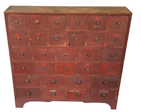 F116 Important mid 19th century Pennsylvania Apothecary with 30 drawers circa 1840 and high bracket base with original drawer labels and beautiful dry red paint. Pharmacy information on the label reads: Moyer Brothers – store located at Main and Central Street, Bloomsburg, PA.