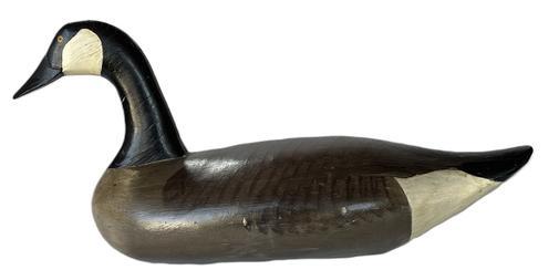 K231 Canada Goose Decoy carved by R. Madison Mitchell (1901-1993) of Havre De Grace, MD in original paint.  Approximate measurements:  24� long x 8 &frac12;� wide x 11 &frac14;� tall. 