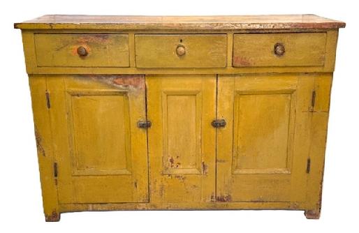 M90 Large Pennsylvania server with three dovetailed drawers over two mortised doors retaining old mustard over original red painted surface. The molded edged panel doors match the stationary center panel and both sides/ends. The wood is white pine with square head nail construction. Clean, natural patina interior. Circa 1840s. Measurements: 61 ¾ wide x 21 ¾ deep x 42 tall. The top board is a full 1 thick.