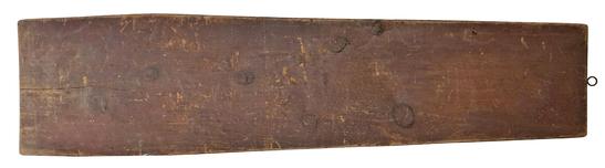 A kitchen table or a board supported by two chairs were both in common use for ironing before the days of the mass-market folding ironing board. (See picture left of a woman using a flatiron on a board balanced over chairs.) There was plenty of advice in 19th century housekeeping books about what size an ironing table should be (various opinions), what wood it should be made of (pale softwood for cleanliness, oak for strength), and how it should be covered (thick woollen ironing-blanket in white baize or red flannel, with a sheet or ironing-cloth on top). D595 19th century Ironing Board , with original red paint , the wood is pine, beautiful old original patina, a hook has been add for hanging circa 1860 Measurements are 64" long x 17" wide
