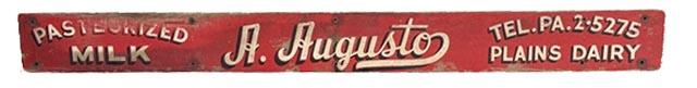 **SOLD** M314 Early 20th century long wooden Pennsylvania Trade Sign Advertising "Pasteurized Milk A. Augusto Tel. PA.2.5275 Plains Dairy". Single sided, featuring original hand-painted lettering done in white with black shadowing on a red painted background. The back of the sign also bears its original red painted surface. Measurements: 88 wide x 8 ¼ tall x 1 thick.