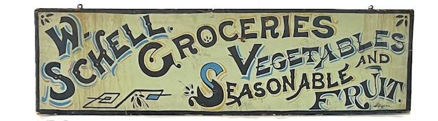 **SOLD** M33 Exceptional late 19th century single sided wood Advertising Sign for: W. Schell Groceries Seasonable Vegetables And Fruit. Single sided with the lettering being hand painted in black with light blue, red, and mustard yellow shadowing on a white background. A black painted border surrounds the edges and it is signed by artist - Weiser - in the lower right corner. One board construction with early iron eye hooks in top for hanging.Circa 1890s-1900. Measurements: 47 ¼ wide x 1 thick x 13 ¼ tall.