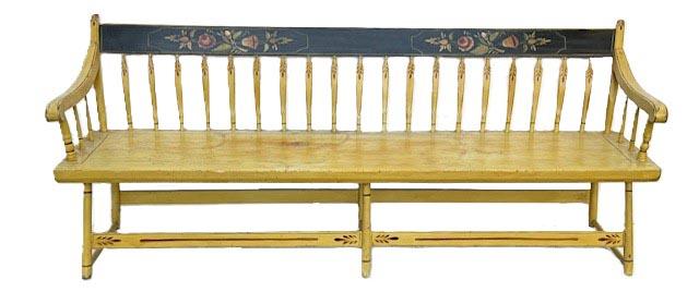 **SOLD** M79 Pennsylvania paint decorated arrow back plank-seat Deacon's Bench/Settee of the mid-19th century (1845-65) bearing its original mustard painted surface with a black painted top rail decorated with floral motifs in greens, reds and gold paint. Gold pin striping throughout. Measurements: 76 wide x 18 deep x 30 ½ tall. The seat is 15 tall.
