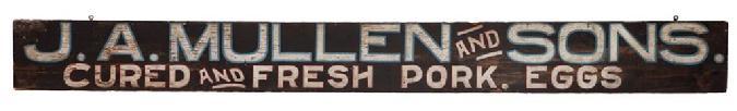 E215 "J.A. MULLEN AND SONS. / CURED AND FRESH PORK. EGGS." against a black ground, original surface with hanging hooks.